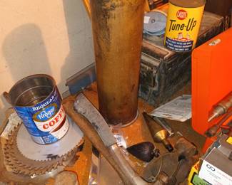 Tools, hatchet, brass shell, etc