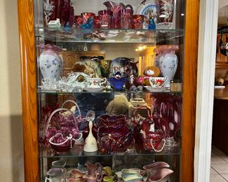 A couple of curio cabinet full