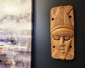 A pair of Indonesian masks, wall art.