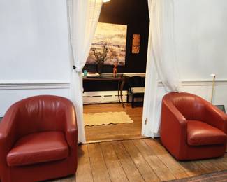 2 leather arm chairs. 