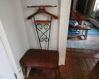 Antique entryway chair with coat hanger, key plate, tie rest.