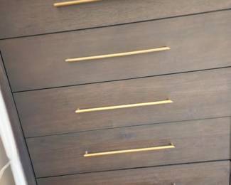 Wooden Amoire with brass handles. Entire set with king bed, 2 night stands, Dresser with mirror. 