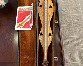 R119 - $350 - H E Herschelman Mountain Dulcimer with case. Looks brand new - excellent condition!
