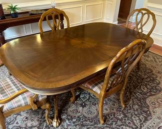 R9 -$275 - Dining Room Table with 8 Chairs. Measures 44" wide x 6' long. 2 captains chairs - 6 regular. Includes 1 leaf - 15" wide. Top does have some wear - see photos. Very sturdy!