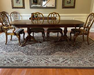 R9 -$275 - - Dining Room Table with 8 Chairs. Measures 44" wide x 6' long. 2 captains chairs - 6 regular. Includes 1 leaf - 15" wide. Top does have some wear - see photos. Very sturdy!
