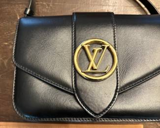 C1 - $1750 - Louis Vuitton Pont 9 Black. Purchased by my client at the LV Store in LA. Certificate of Authenticity provided from Real Authentication. Only used a couple times. Overall in *very* good condition. There is a 1" scuff in the leather on the back - that is the only issue noted. Strap is adjustable. Gold accents are in very good condition. Gorgeous bag!