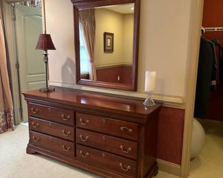 R47 - $150 - Long Triple Dresser. Measures 66" long x 19" deep x 32" tall. All drawers slide easily. No name - back says Made in Dublin GA.