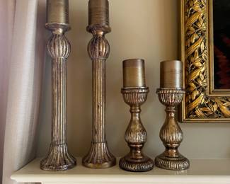 R20 - $10 PAIR - left wooden candle holders 18.5" tall. $15 PAIR - right glass candle holders 10.5" tall.