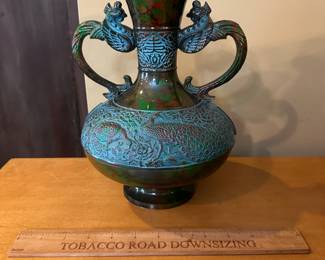 R96 - $75 - Vintage Metal Asian Vase. Measures 8.5" wide x 10.5" tall.
