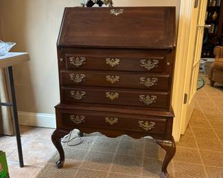 R61 - $125. Ethan Allen Slope Lid Secretary Desk. Measures 26" wide x 18" deep x 40" tall.