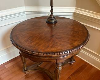 R32 - $75 - Round Entry Table measures 38" across x 31.5" tall. Minor surface scratches on top - sturdy.