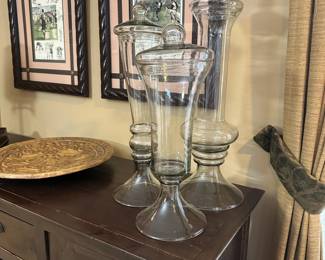 R73 - $40 - Set of 3 large glass (19" 22" 24") decorative lidded vessels.