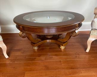 R16 - $45 - Glass Insert Coffee Table. Measures 40" wide x 19" tall.