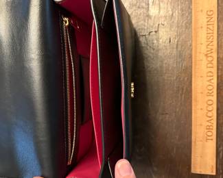 C1 - $1750 - Louis Vuitton Pont 9 Black. Purchased by my client at the LV Store in LA. Certificate of Authenticity provided from Real Authentication. Only used a couple times. Overall in *very* good condition. There is a 1" scuff in the leather on the back - that is the only issue noted. Strap is adjustable. Gold accents are in very good condition. Gorgeous bag!