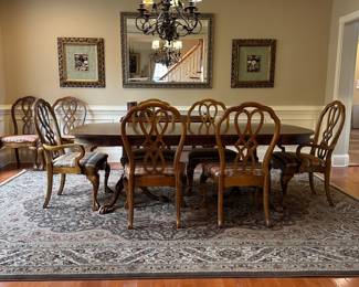 R9 -$275 - Dining Room Table with 8 Chairs. Measures 44" wide x 6' long. 2 captains chairs - 6 regular. Includes 1 leaf - 15" wide. Top does have some wear - see photos. Very sturdy!