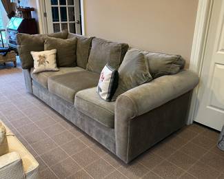 R90 - $75 - Green Microfiber Couch. Measures 92" long x 37" deep x 30.5" tall. (Might be part of a sectional - only one arm is rolled)