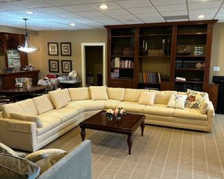 R89 - $1500. LARGE DOWN Sectional - (believed to be Henredon - but it was reupholstered and the tags are covered/gone) Moves in 3 pieces. Has been wrapped in plastic and in climate controlled storage in the home - we're trying to fluff the cushions back up! Assembled it is 10.5' left side x 12' right side. Happy to send measurements of each piece if needed. Couch sits very low - about 16". Back of the couch is 25". Cushions take it up to 30"