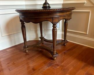R32 - $75 - Round Entry Table measures 38" across x 31.5" tall. Minor surface scratches on top - sturdy.