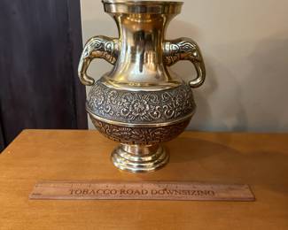 R98 - $60 - Brass Vase with Elephant Handles 8.5" wide x 10" tall.