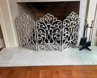 R18 - $35 - Folding Metal Fire Place Screen. Each panel measures 16" wide x 26" tall.
