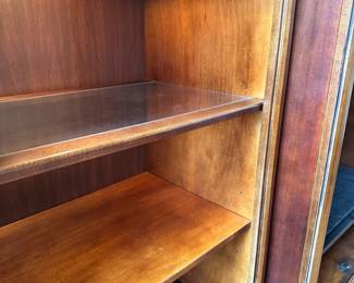 R1 - $150 - 3 Piece Basset Media Cabinet. Both ends have lights. Moves in 3 pieces. End Sections are 29.5" wide x 20" deep x 74.5" tall. Middle part is 45" wide at the main part (50.5" with trim) x 23.5" deep ( 27" deep with trim) x 79" tall.