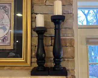 R63 - $15 - Pair of Wooden Candle Holders. One is 16.5" tall the other is 20.5" tall.