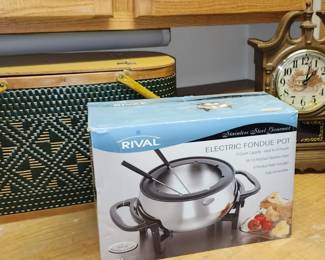 Vintage picnic basket, fondue set. Vintage decorative elements throughout.
