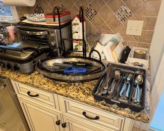 Convection oven, Toaster oven, flatware, lots of nearly new kitchen stuff