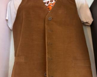 This vest and these jeans have seen a few rodeo (bars).