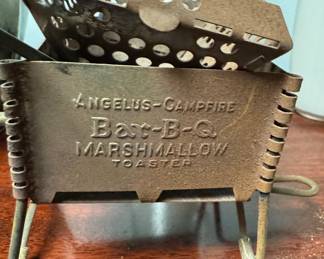 Adorable tiny Bar-B-Q marshmallow toaster