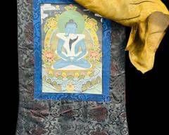 Vintage Tibetan Thangka Painting With Ornate Silk Brocade, Featuring A Meditative Buddha Design.
