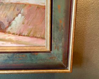 Many pictures and paintings throughout the home all masterfully framed