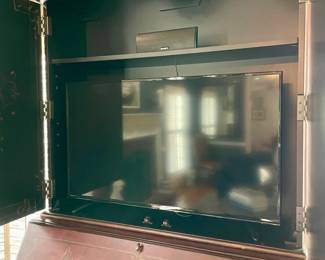 Stunning Seven Seas by Hooker Secretary that conceals flat screen TVs, its a desk as well