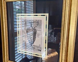 A lot of great framed pictures, architectural, historical themes