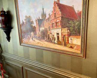 Many pictures and paintings throughout the home all masterfully framed