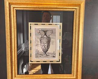 A lot of great framed pictures, architectural, historical themes