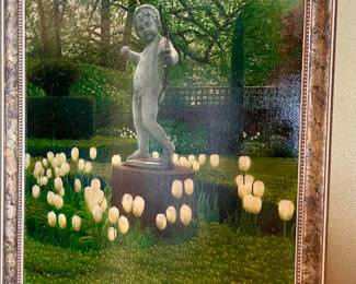 Many pictures and paintings throughout the home all masterfully framed