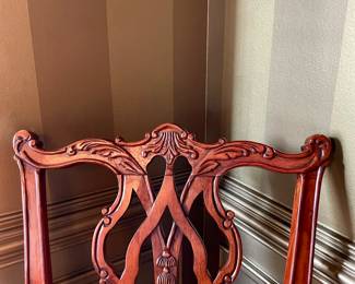 Unusual Table and 8 chairs carved not only on the front but also on the back of the chairs so that you can enjoy them from across the room when not seated at the table.