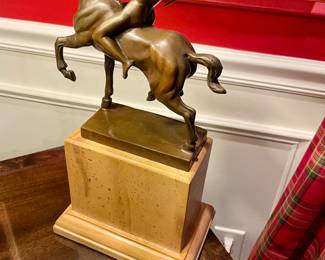 Marble and metal statue