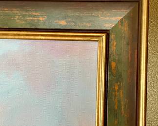 Many pictures and paintings throughout the home all masterfully framed