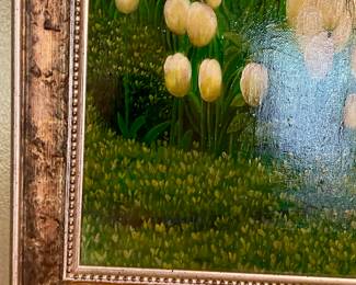 Many pictures and paintings throughout the home all masterfully framed