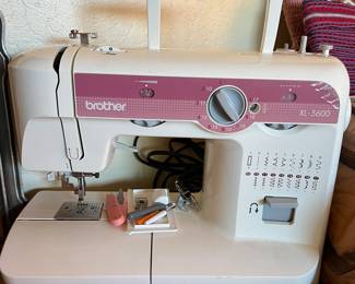 Brother XL-5600 Free Arm Sewing Machine with 17 built-in stitches and 46 stitch functions
