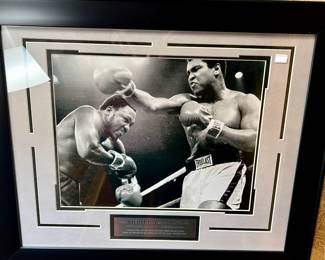 Muhammad Ali framed photo, more DVDs on boxing.