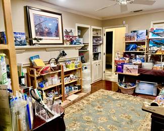 Packed Hobby room with model kits including Military WWII tanks, airplanes, etc. Decals, model masks, paints, model making equipment. 
