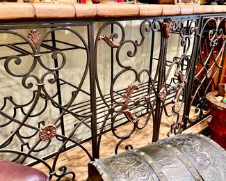 Heavy piece-will need movers.  quality wrought iron wine holder.