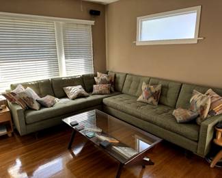 2- pieces that attach with latch mechanism at the corner of the sectional.
Long section is 8 feet long and 36 deep and 34 tall.
Shorter section is 6 feet long by 36 deep x 34 tall.
Pillows not included.
