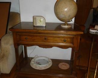 small server-type table, vintage clock, globe