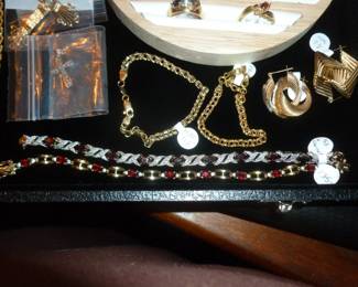 close-up of bracelets, earrings & the 2 sterling bracelets