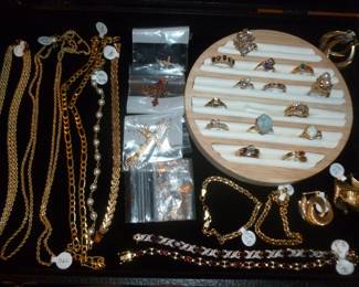 Gold jewelry..chains, bracelets, rings, earrings & crosses. (the 2 bracelets on the bottom right are sterling)