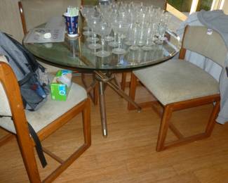 Mid-Century Table w/coolest base  (The chairs all need cleaning, The table is priced and you can either take the chairs or not)